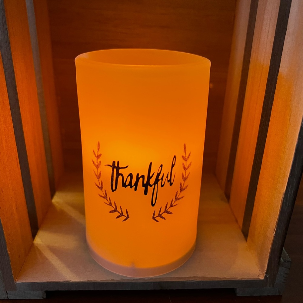 White battery operated Thankful flicker pillar candle